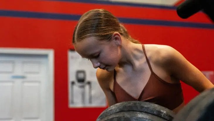Teen setting up equipment
