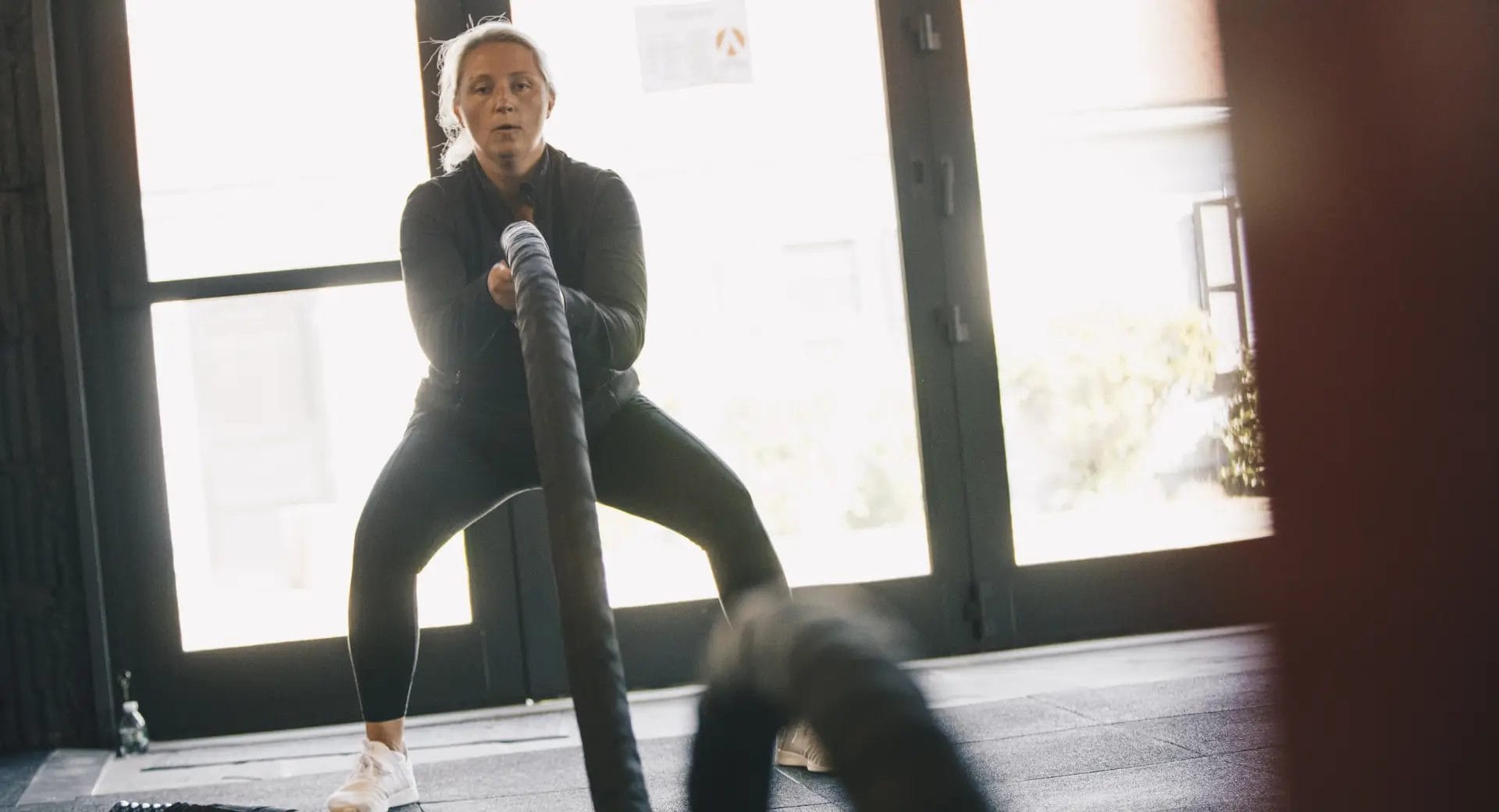 Woman training with rope